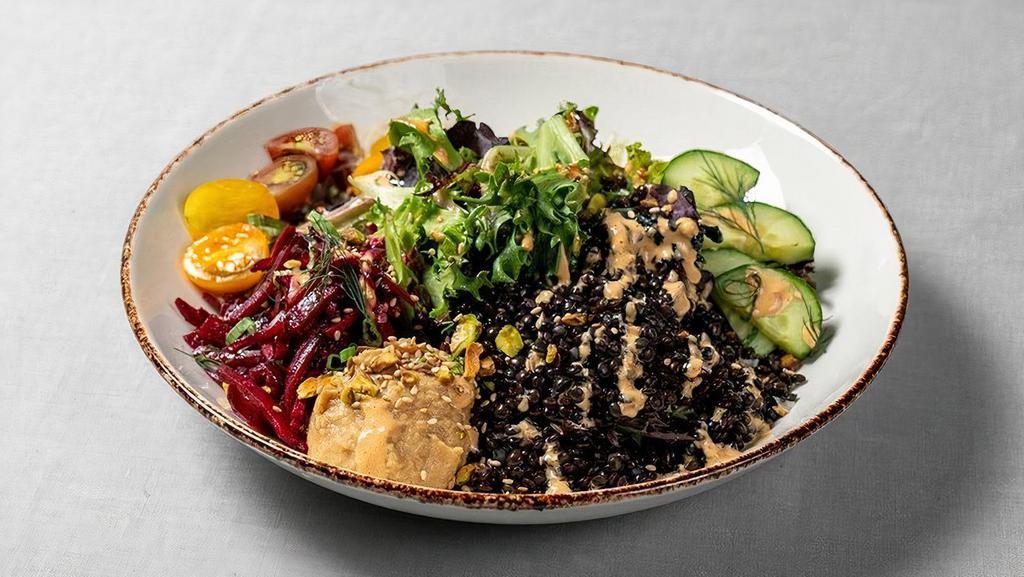 Black Lentil Salad · balsamic beets, hummus, lentils, and grape tomatoes with mixed greens, vinaigrette and spicy tahini