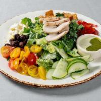 Mediterranean Caesar With Chicken · Grilled chicken with Nicoise olives, bell pepper, feta, and croutons on romaine and kale wit...