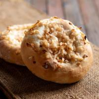 Bialy · Not cooked in boiling water before baking - like an onion roll.