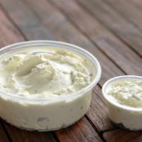 Cream Cheese With Garlic · Soft cream cheese whipped to perfection mixed with garlic.