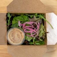 Salad - Mixed Baby Greens · Individual portion of mixed baby greens, topped with some pickled onions. Comes with an indi...