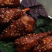 Chicken Wings (4 Pieces) · Choose from:  Caramelised soy chili lime,  Sticky 'Fish' sauce + Peanuts,  Gochujang sesame ...