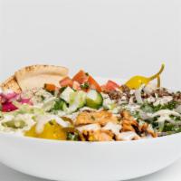 Build A Bowl · Comes with a side of pita. Choose a base and a protein. Choose up to two sauces. Choose up t...