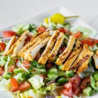 Chicken Breast Salad · Chopped lettuce, tomatoes, onions topped with grilled chicken breast, and creamy house dress...
