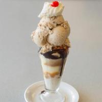 Black & Tan - · Creamy Vanilla and Toasted Almond ice cream drowned in Leatherby's famous Caramel and Chocol...