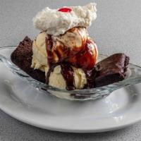 Brownie Delight - · A delicious Chocolate Brownie served with creamy Vanilla ice cream, topped with Leatherby's ...