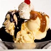 Brownie Bliss - · Double the brownie. Loads more creamy vanilla ice cream, topped with our homemade Caramel an...