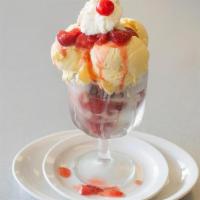 Strawberry Shortcake - · Juicy strawberries layered between tasty Vanilla cake and topped with our famous Vanilla ice...