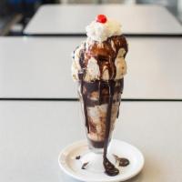 Java Fudge - · Our homemade Chocolate sauce flows over an eye opening duo of Coffee and Mocha Royale ice cr...