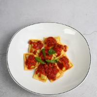 Meat Ravioli · filled with herbs and beef served with marinara or meat sauce