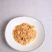 Shrimp Scampi · Shrimp with lemon juice, white wine, garlic, and butter, tossed with spaghetti.