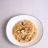 Spaghetti With Clams · Clams served in a big steamy bowl, in a tomato (red) broth or white wine broth over spaghetti.