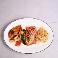 Grilled Salmon · Grilled salmon with choice of spaghetti marinara or vegetables.