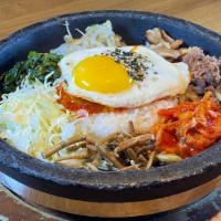 Bibimbab Hot Stone(Vege) · Rice, Assort Vege, KimChi, Fried Egg and Go Chu Jang Sauce on Hot Stone Pot