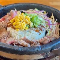 Brisket Hot Stone · Brisket, Red Onion, Bean Sprout, Corn, Green Onion, Pepper, House Soy sauce, on Hot Stone Pot