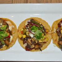 Chipotle Mushroom Tacos · Lime scented mushrooms, chipotle, pasilla peppers, onion, corn pepper relish, cilantro, serr...