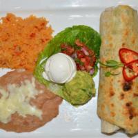 Baja Asada Burrito · Fresh guacamole, cilantro, red onion, avocado tomatillo salsa, chipotle mojo, Mexican queso ...