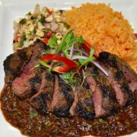 La Asada Con Salsa · Chimichurri marinated skirt steak and roasted salsa Roja or chimichurri sauce. Served with S...