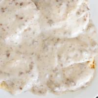 Biscuits & Gravy · Buttermilk biscuits smothered with country style gravy.