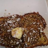 Classic French Toast · Topped with powdered sugar, cinnamon, and butter.