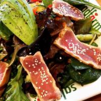 Seared Tuna Salad · Seared tuna, mixed greens, tomatoes, cucumbers, carrots, avocado.