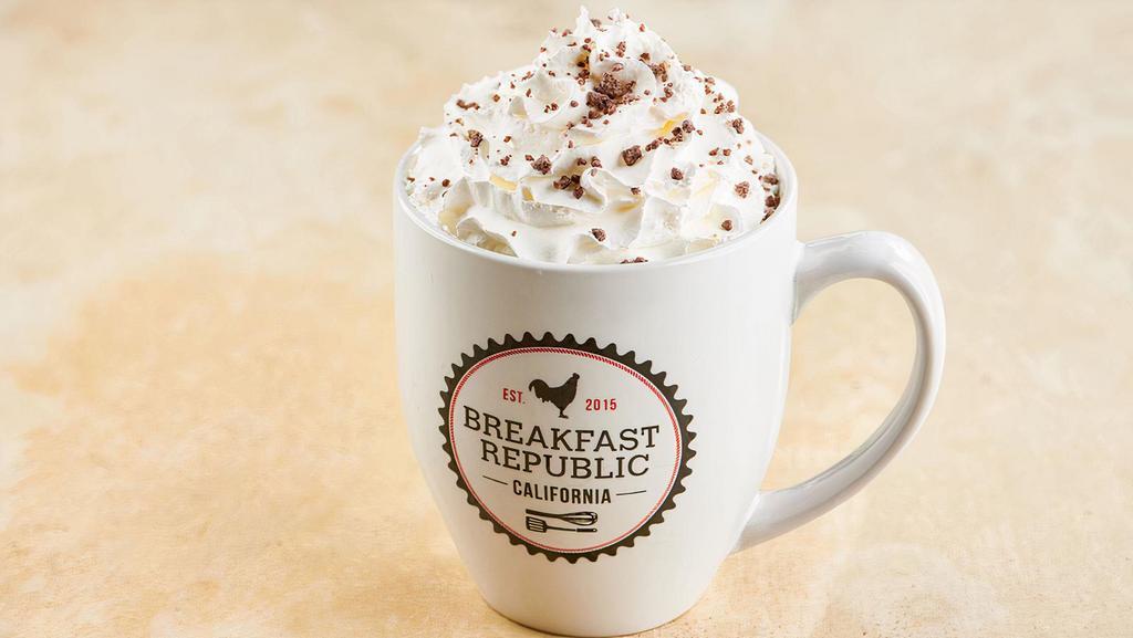 Mexican Mocha · Espresso, Mexican chocolate powder and steamed milk topped with whipped cream.