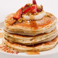 Tres Leches Pancakes (Vegan) · Vanilla pancakes, vegan sweet buttercream, fresh strawberries, almond, coconut, and soy milk...