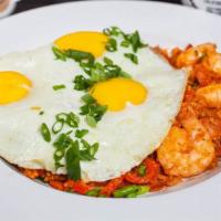 Breakfast Jambalaya · Shrimp and Portuguese linguica sausage, rice, green onions, red bell pepper, and fire roaste...