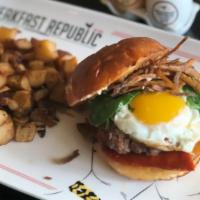 Breakfast Burger · Beef patty, Portuguese linguisa sausage, muenster cheese, egg any style, spinach, fried onio...