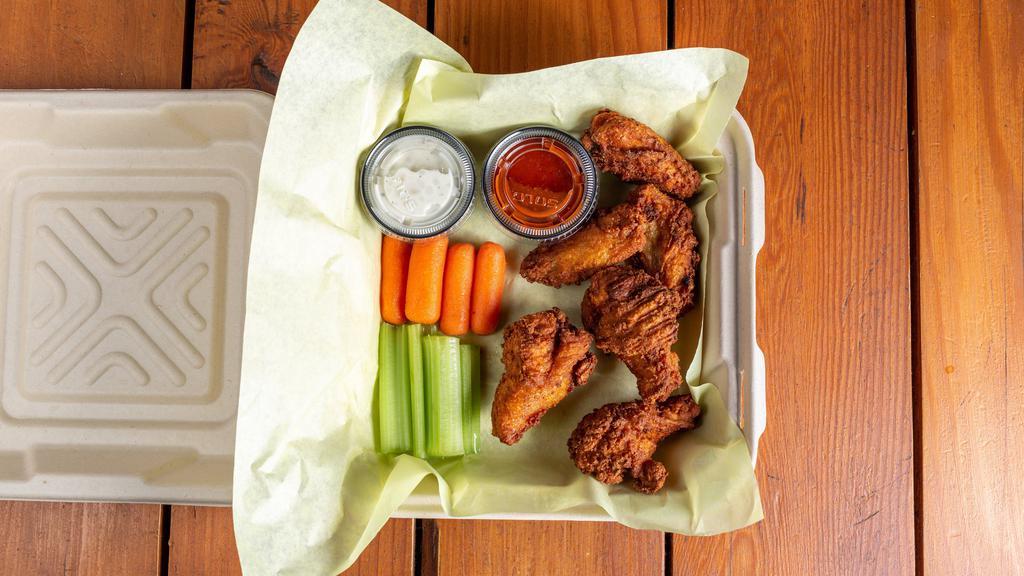 Wings · Served with choice of dipping sauce: ranch,  blue cheese, BBQ, buffalo.