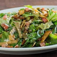 Numex Caesar · Organic Romaine lettuce, roasted peppers, pepitas, chili croutons, non-GMO corn tortilla str...