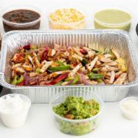 Fajita Taco Fiesta For 4 · Our Fajita Taco  Fiesta feeds a group of 4-6 and comes with your choice of protein, Mexican ...