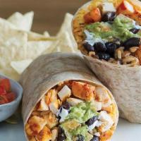 Fiesta Burrito · Non-GMO rice, organic beans, cheese, guacamole, sour cream, salsa verde & protein