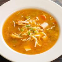 Chicken Tortilla Soup · Rich broth with chicken, carrots, and onions; finished with tortilla strips and shredded che...