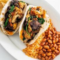 Roasted Cauliflower & Mushroom Taco Plate · Two Roasted Cauliflower and Mushroom tacos with organic rice & beans.