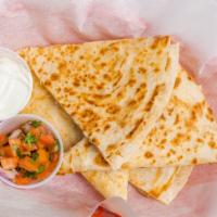 Quesadilla · Large flour tortilla filled with Chihuahua cheese. Served with sour cream and pico de gallo,...