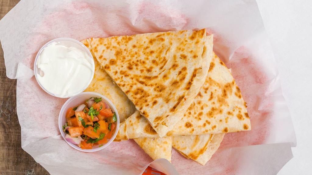 Quesadilla · Large flour tortilla filled with Chihuahua cheese. Served with sour cream and pico de gallo, chicken or ground beef steak for additional charge.