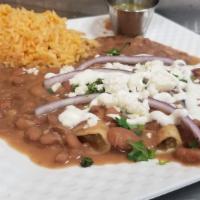 Enfrijoladas With Queso Fresco · Enfrijoladas yes just like enchiladas but with beans and with queso fresco.  and served with...