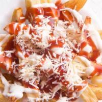 Salvadorian Fries With Crumbly Cheese And Ketchup · 