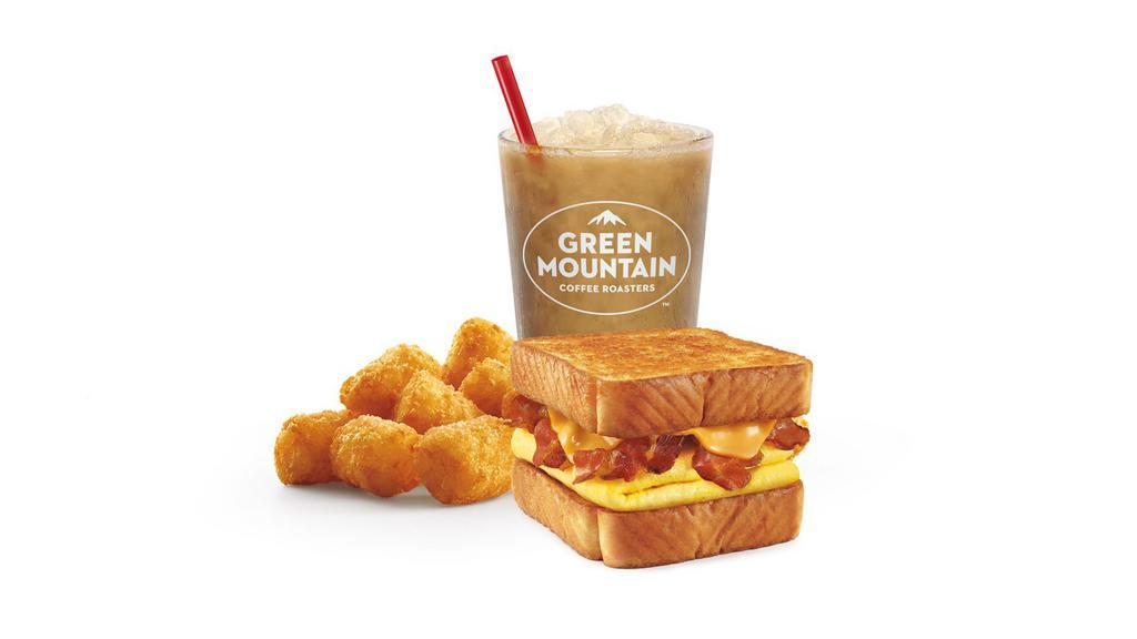 Breakfast Toaster® Combo · It’s served with egg, cheese, and choice of sausage or bacon. Includes choice of tots or fries and fountain drink.