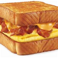 Breakfast Toaster® · Fluffy eggs, melted cheese, and your choice of protein stacked on thick Texas toast.