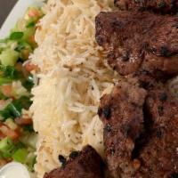 Beef Kabob · Chunks of beef marinated with Afghan spices. Grilled to perfection served with naan rice and...