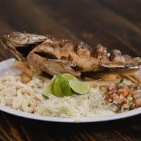 Mojarra Frita · Whole deep-fried mojarra fish (tilapia) served with a side of fries, macaroni crab salad, ca...