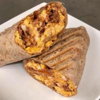 Breakfast Wrap · Mild salsa, three eggs, shredded cheese, your choice of meat, all wrapped up in a wheat tort...