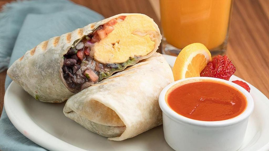 Breakfast Burrito · A flour, whole wheat, spinach or gluten-free tortilla stuffed with organic scrambled eggs, organic black beans, jack cheese & salsa. Served with guacamole & mild Chipotle sauce. (Served all day)