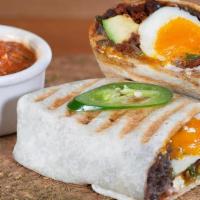 Huevos Rancheros Burrito · Farm fresh eggs, house-made Ranchero sauce, black beans, soy chorizo, almond cheese, ripe av...