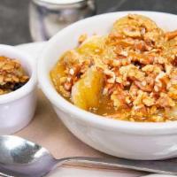 Banana Nut Oatmeal · Our organic oatmeal topped with cooked bananas in a light caramel sauce and sprinkled with t...