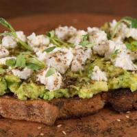 Avocado Toast · Our sprouted ancient grain bread toasted and topped with ripe 
Hass avocados, almond cheese,...