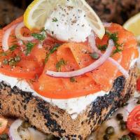 D'Lox Toast · Thick sliced English Buckwheat Toast topped with Lox, cream cheese, tomatoes, capers, thinly...