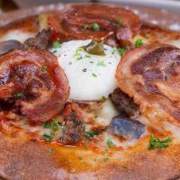 Sunrise Pizza · Sausage, pancetta, mozzarella, potatoes, poached egg & sage butter.